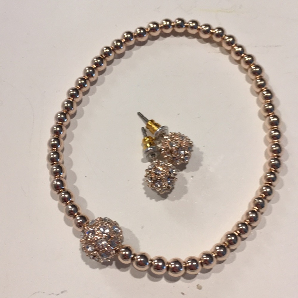 Rose goldtone bracelet and earring set